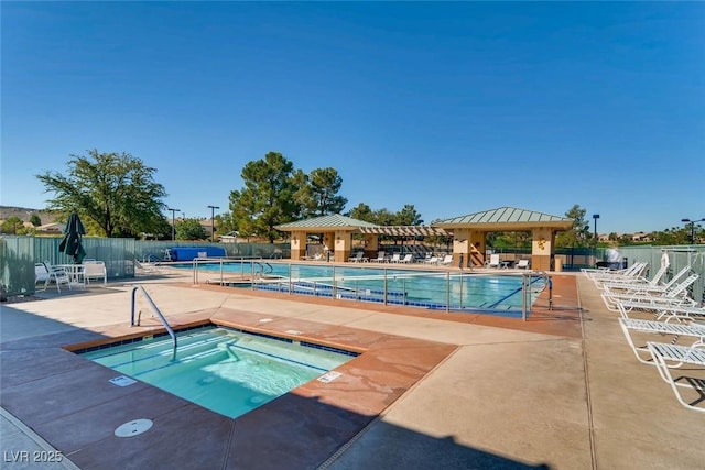538 Cypress Gardens Pl, Henderson, NV 89012 - pool with a community hot tub, a patio area, fence, and a gazebo