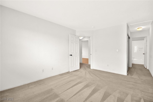 unfurnished bedroom with light carpet