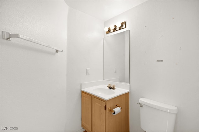 half bath with toilet and vanity