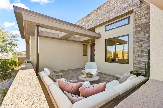 view of patio with an outdoor living space