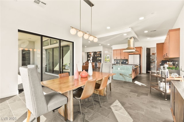 dining space featuring baseboards, visible vents, and recessed lighting