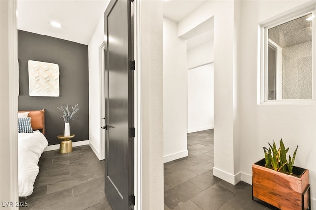 bathroom featuring baseboards