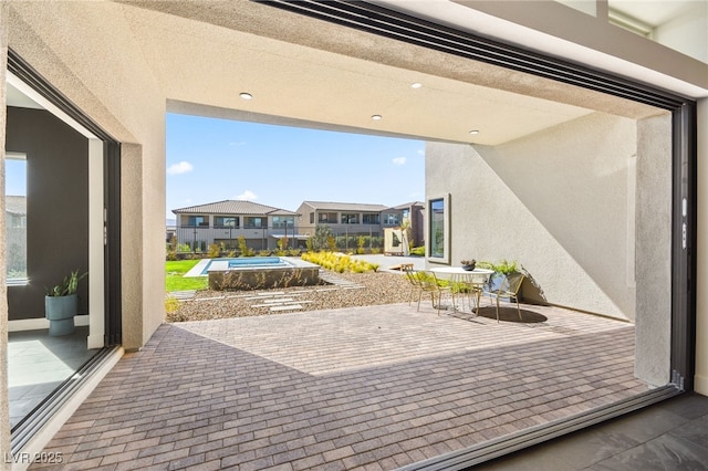 view of patio / terrace featuring a residential view