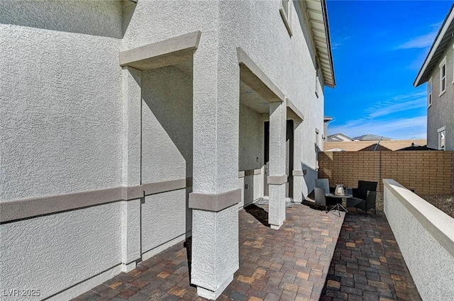 view of patio with fence