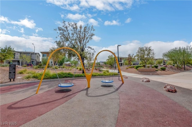 community play area with a residential view