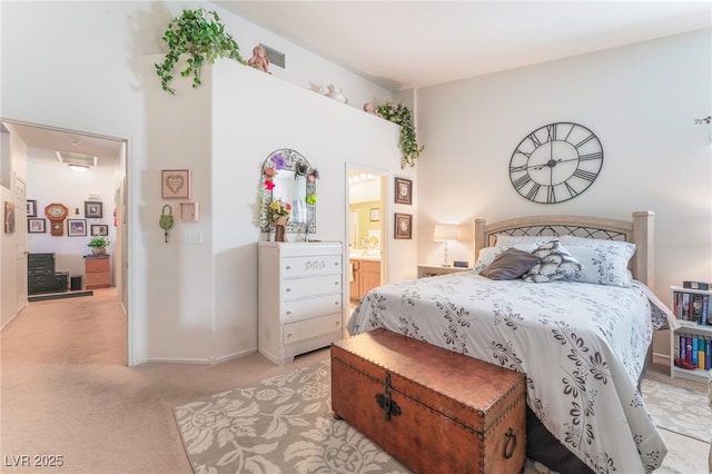 bedroom featuring light carpet, baseboards, and visible vents