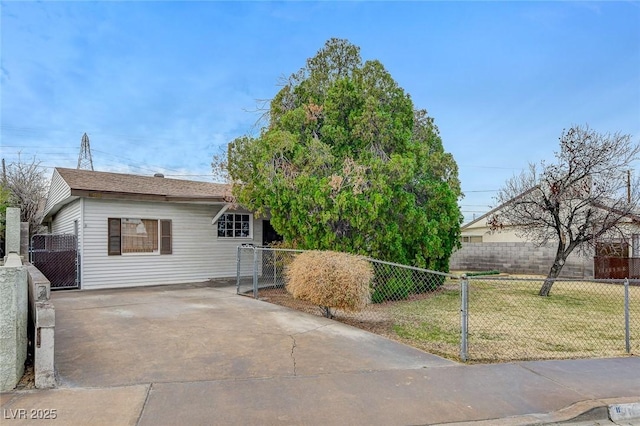 view of front of property with a fenced front yard and a front yard