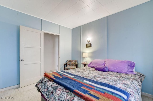 bedroom featuring light colored carpet