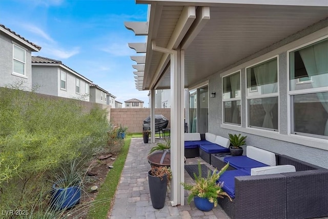 view of patio with a fenced backyard and an outdoor living space