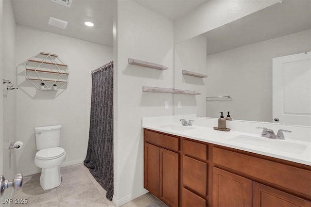 bathroom with double vanity, a sink, toilet, and a shower with curtain