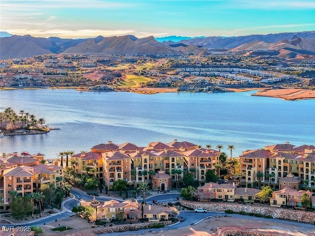 water view with a residential view and a mountain view