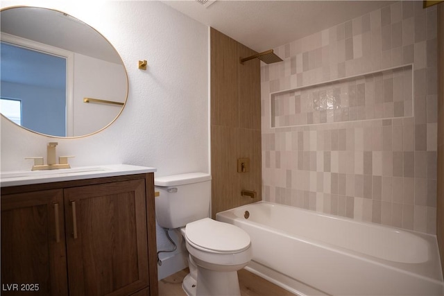 bathroom with  shower combination, vanity, and toilet