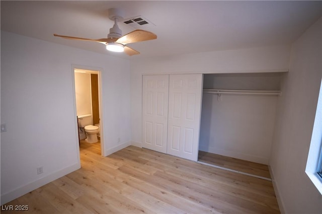 unfurnished bedroom with visible vents, baseboards, connected bathroom, light wood-style flooring, and a closet