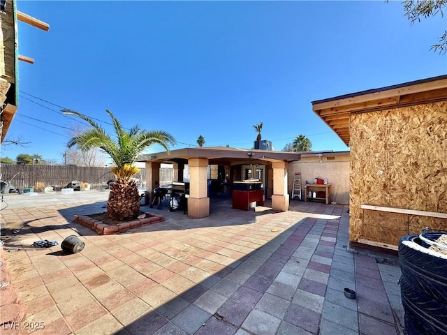 view of patio / terrace with fence