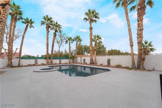 view of pool with a fenced in pool, a fenced backyard, and a patio