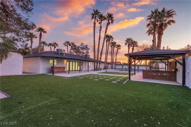 exterior space with a gazebo, central AC, a patio area, and fence