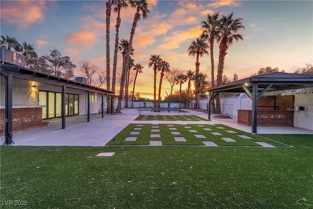 view of yard featuring a gazebo, a patio, and fence