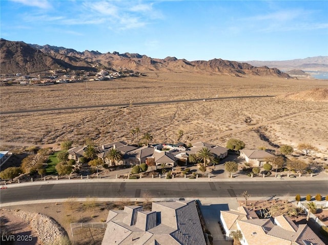 drone / aerial view with a residential view and a mountain view