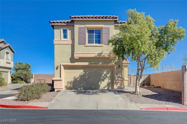 view of front facade featuring a tile roof, stucco siding, concrete driveway, an attached garage, and fence