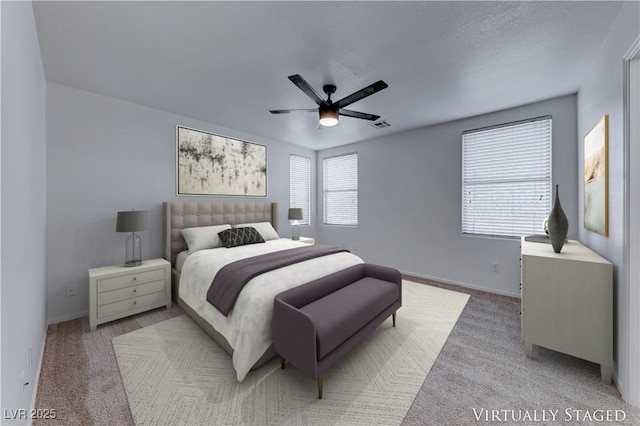 bedroom featuring light carpet, baseboards, visible vents, ceiling fan, and a textured ceiling