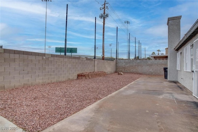 view of yard featuring a fenced backyard and a patio