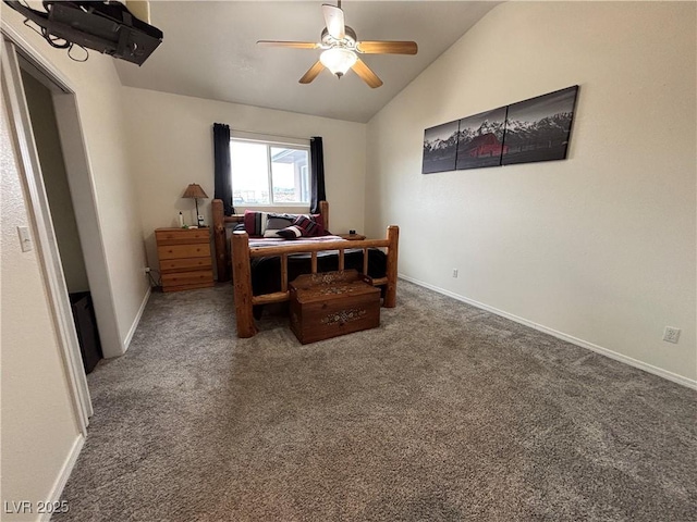 bedroom with vaulted ceiling, a ceiling fan, baseboards, and carpet floors