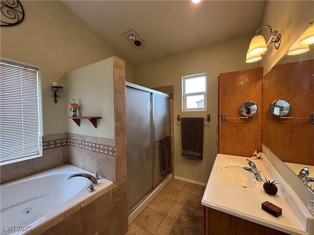 full bathroom with tile patterned floors, a shower stall, a bath, and vanity