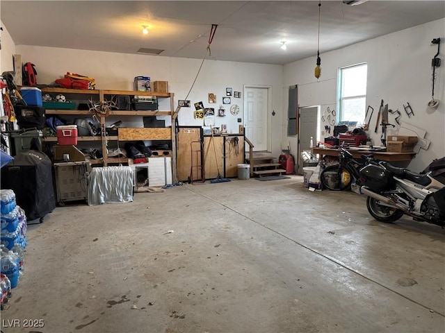 garage featuring a workshop area