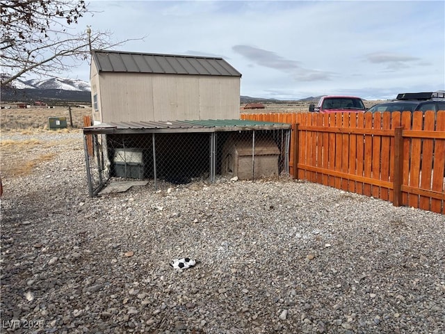 view of poultry coop featuring fence private yard