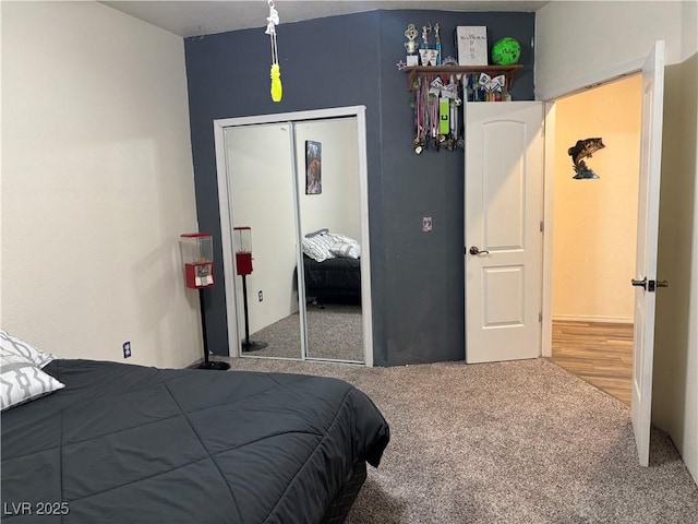 carpeted bedroom with a closet