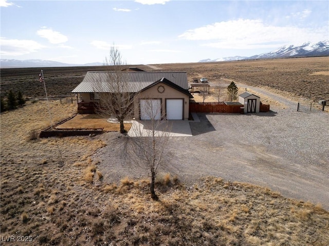 exterior space with a rural view and a mountain view