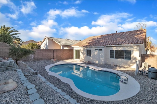 view of swimming pool with a fenced in pool and a fenced backyard