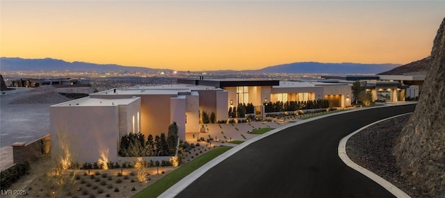 exterior space featuring a residential view and a mountain view