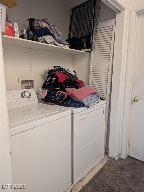 clothes washing area with independent washer and dryer