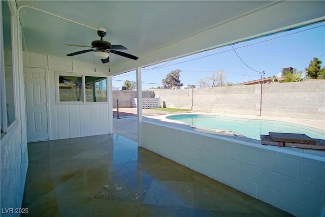 view of pool with a fenced backyard, a ceiling fan, and a fenced in pool