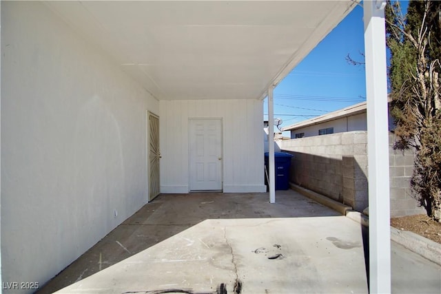 view of patio featuring fence