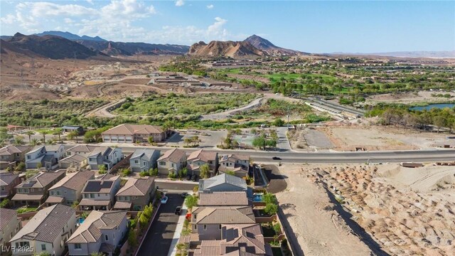 aerial view featuring a residential view and a mountain view