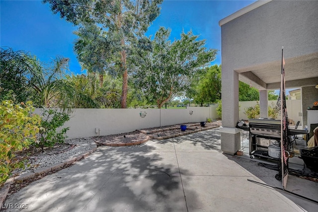 view of patio featuring a fenced backyard