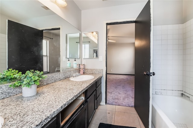 full bathroom with  shower combination, tile patterned flooring, and vanity