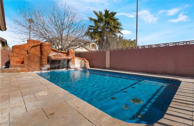 view of swimming pool with a fenced backyard and a fenced in pool