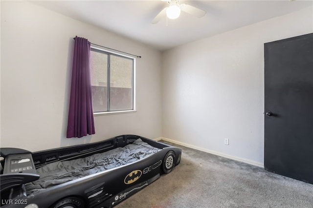 bedroom featuring carpet floors, a ceiling fan, and baseboards