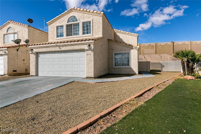 view of front of house with a garage, fence, driveway, a tiled roof, and stucco siding