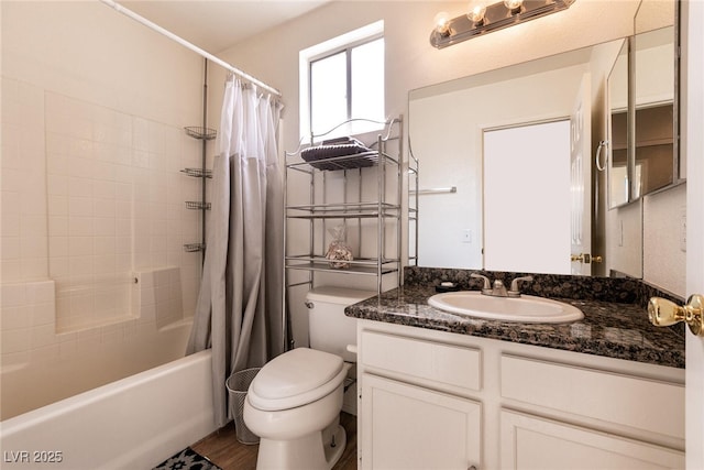 full bath featuring shower / bath combination with curtain, vanity, and toilet