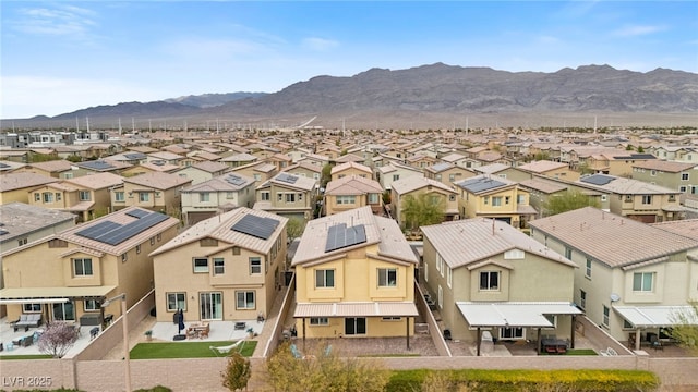 birds eye view of property with a residential view and a mountain view