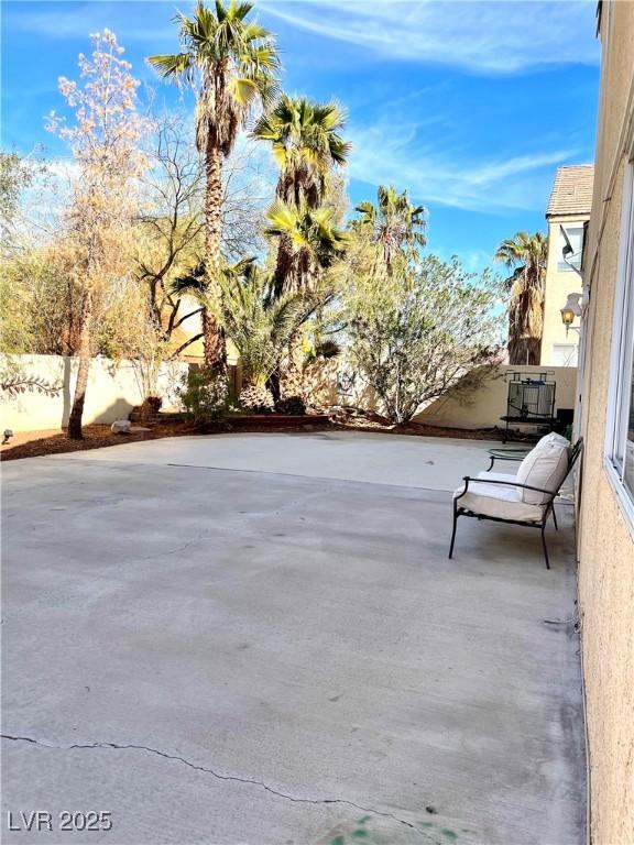 view of patio with fence