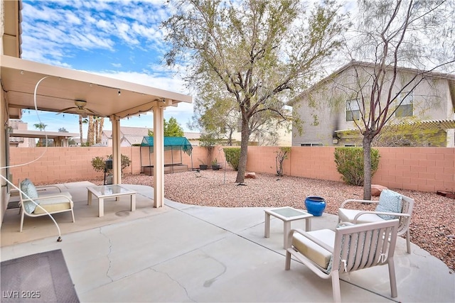 view of patio / terrace featuring a ceiling fan and a fenced backyard