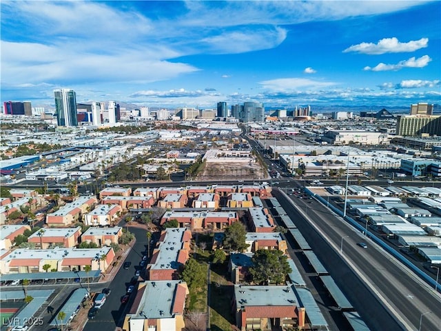 birds eye view of property with a city view