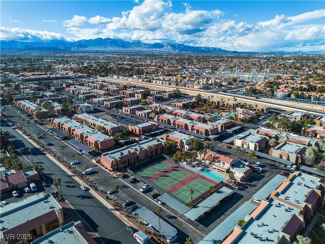 aerial view with a view of city and a mountain view