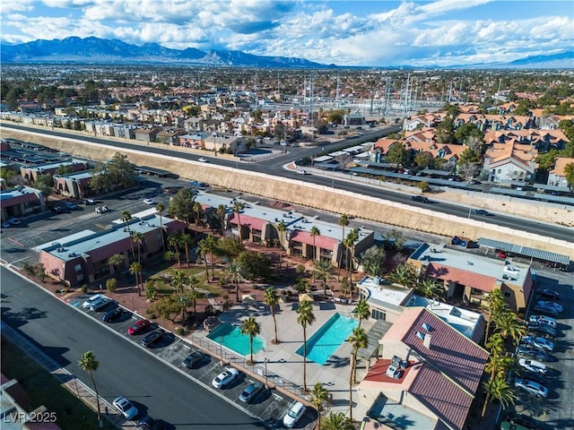 drone / aerial view with a residential view and a mountain view