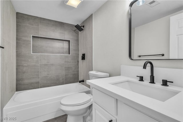 full bathroom with toilet, shower / tub combination, visible vents, and vanity